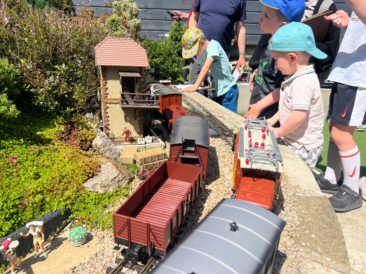 Children watching the trains together on a past open day