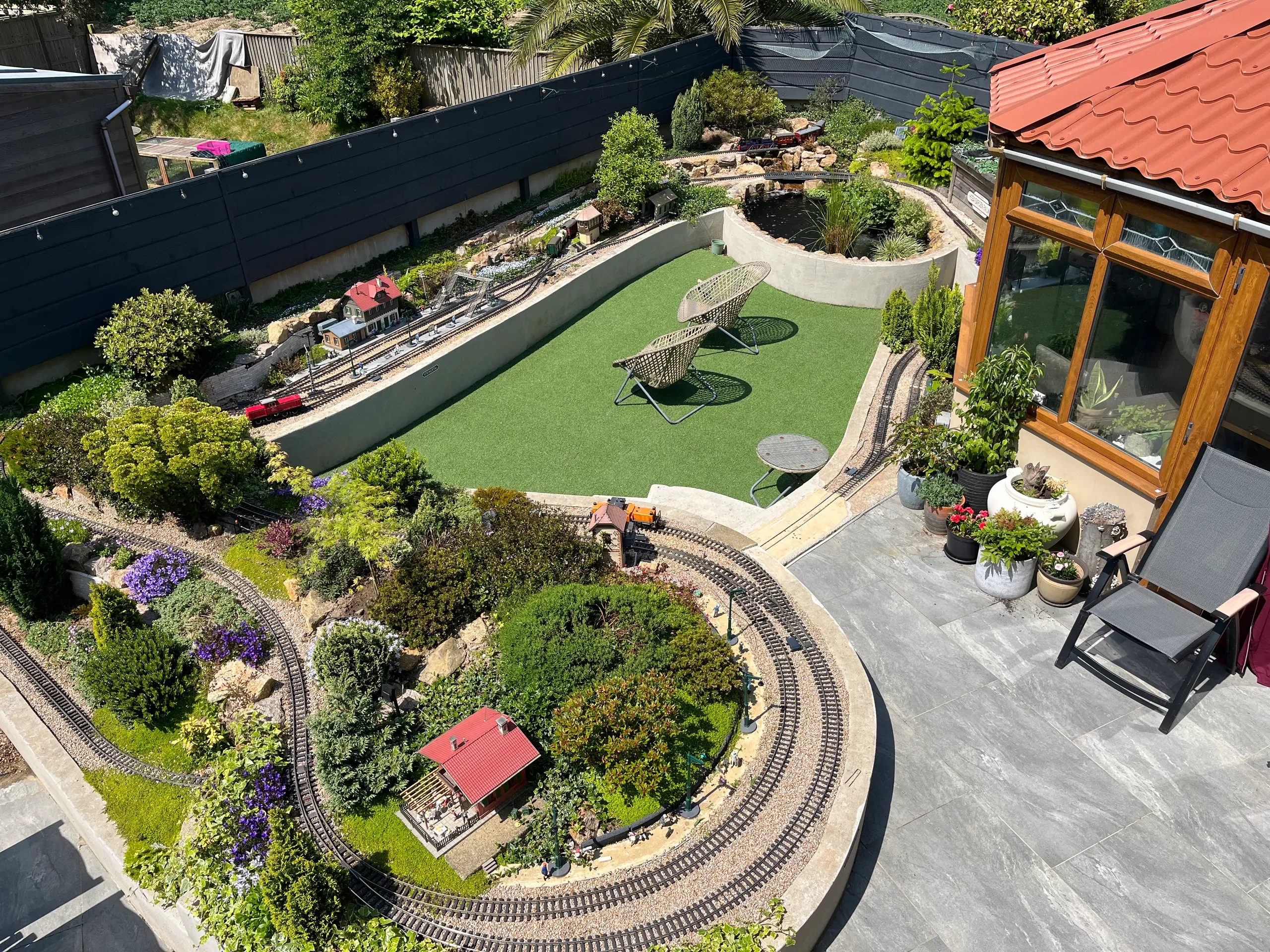 An aerial view of the garden railway line running through the layout